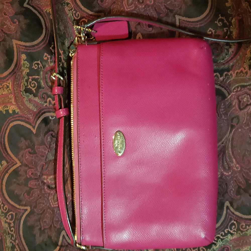 Rose pink leather Coach crossbody bag. Excellent Used Condition